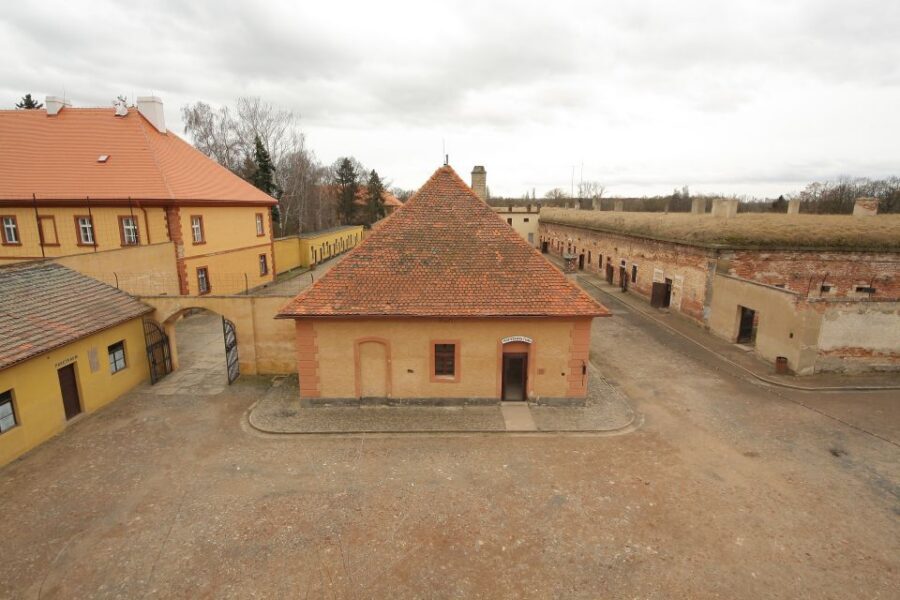 From Prague: All-inclusive Bus Tour to Terezin Memorial - Small Fortress and Crematorium: The First Stop That Sets the Tone