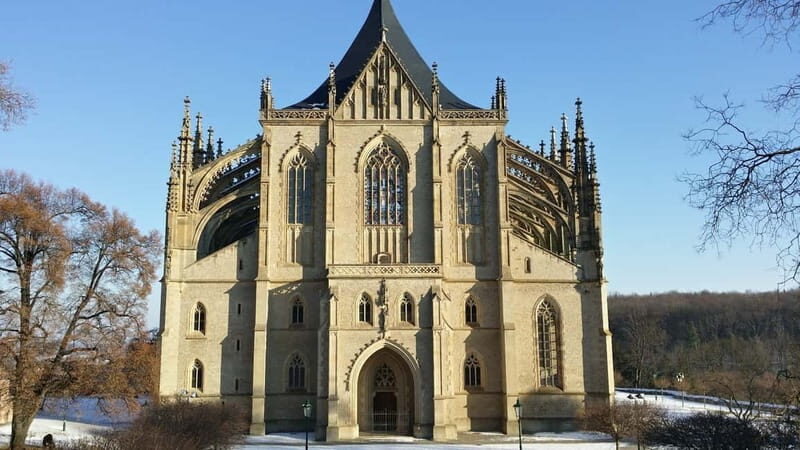 From Prague: Half-Day Coach Tour to Kutná Hora - The mining story that shaped Kutná Hora: Italian Court and Hrádek