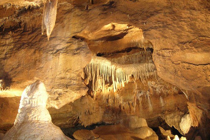 From Prague: Small-Group Karlstejn Castle & Koneprusy Caves Trip - Karlštejn village stroll: a short dose of medieval life below the fortress