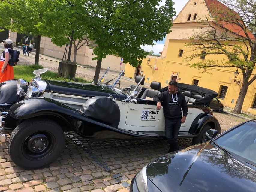 Prague: 1-Hour Private Tour in Vintage Car - Moving toward Prague Castle: Charles Bridge views and the biggest castle feeling