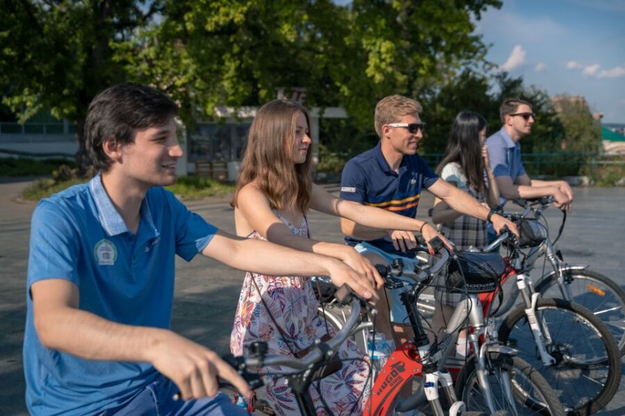 Prague: Bike or E-Bike City Tour with A Local Guide - Meeting at Hotel Grandior: practice, rain gear, and a clear start