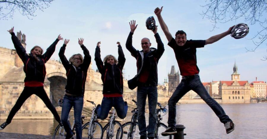 Prague: Bike or E-Bike City Tour with A Local Guide - Petřín Park and the John Lennon Wall: parks, perspective, and real stops