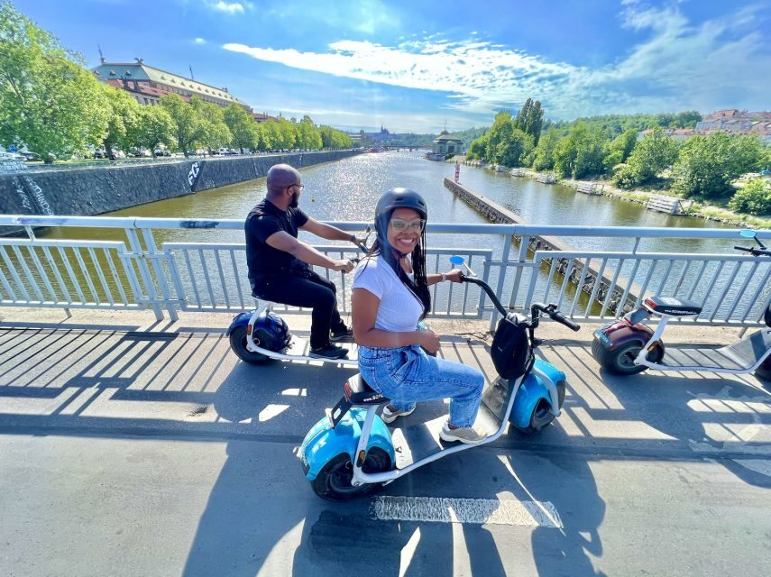 Prague: Fat Tire E-Scooter Guided Tour - Charles Bridge to the narrowest street: orientation with style
