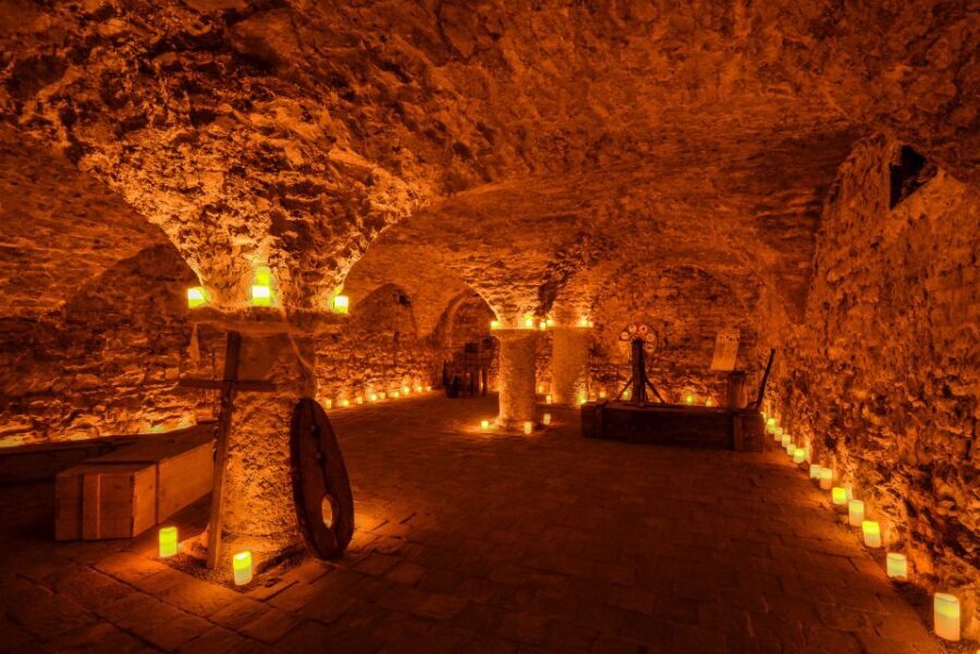 Prague: Ghosts, Legends, Medieval Underground & Dungeon Tour - The dungeon by candlelight: Jan Mydlář and medieval torture instruments