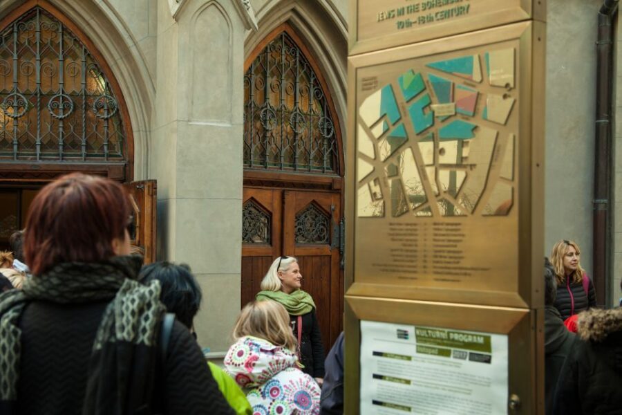 Prague: Old Town and Jewish Quarter Guided Tour in German - Clementinum exteriors: a break in tempo before the river