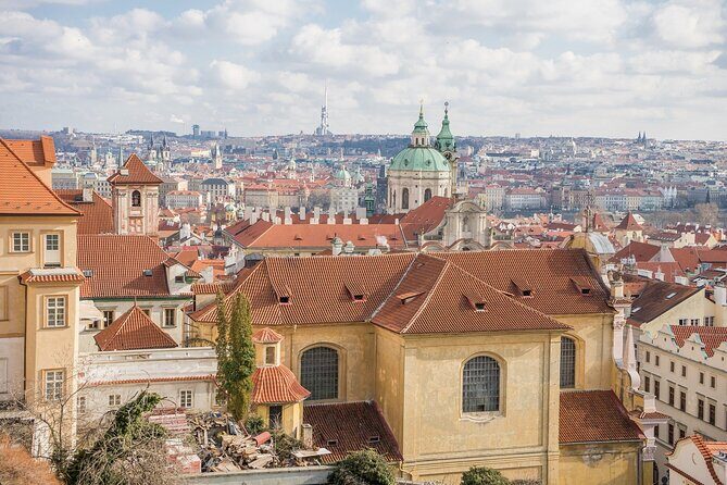 Private Prague City Highlights Tour with a Stop at a Czech Cafe - Charles Bridge and the peace-themed graffiti stop: the river-crossing moment